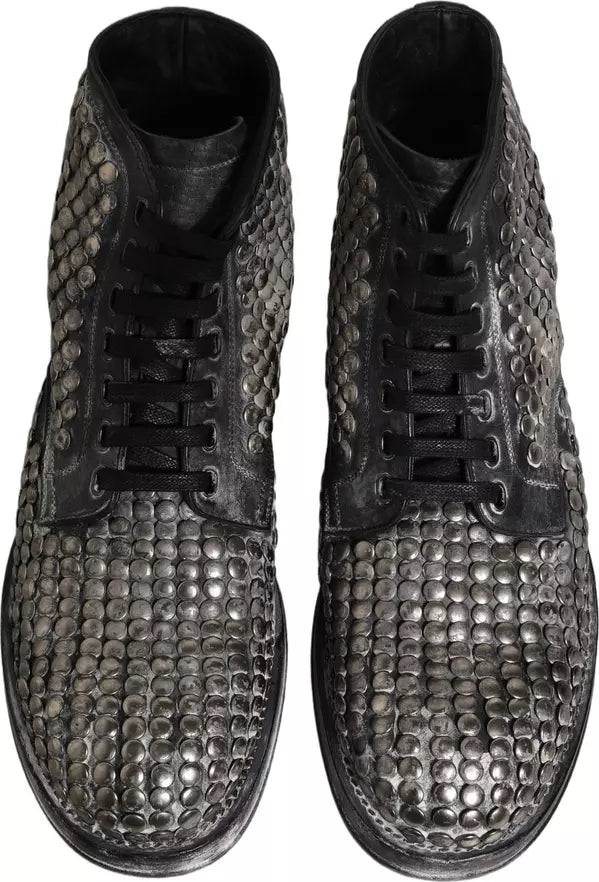 Dolce & Gabbana men’s black leather studded ankle boots with metallic runway accents