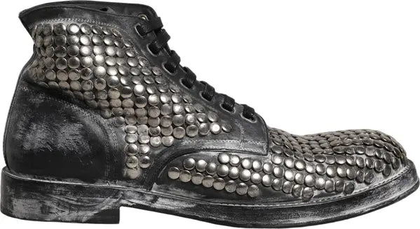 Dolce & Gabbana men’s black leather studded ankle boots with metallic runway accents