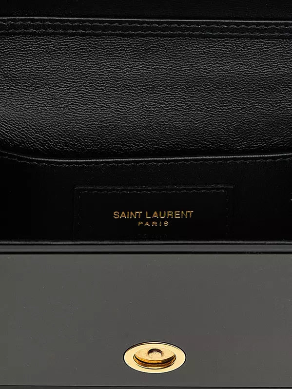 Black leather handbag with 'Saint Laurent Paris' branding and gold hardware.
