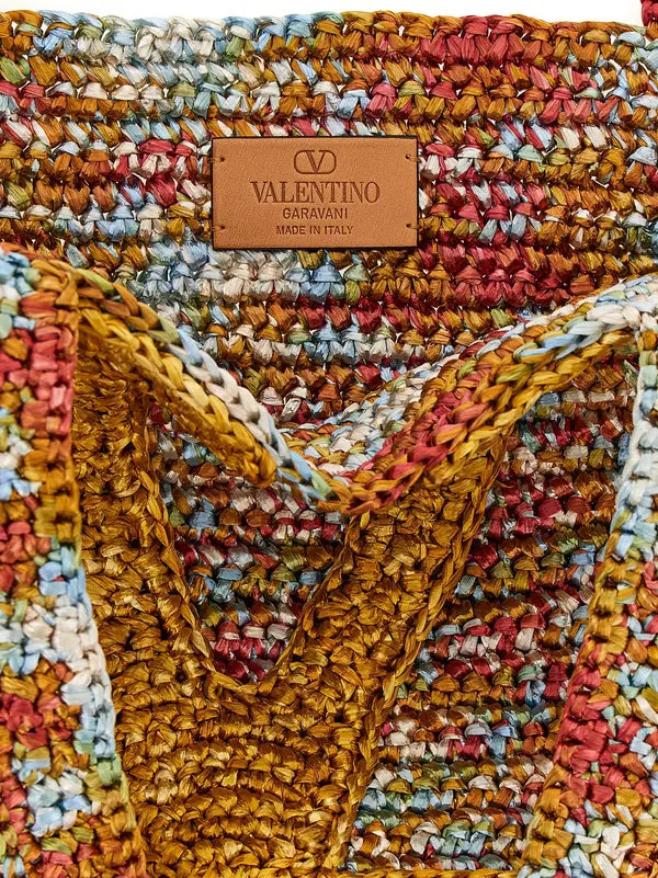 Multicolored textured fabric with a Valentino label