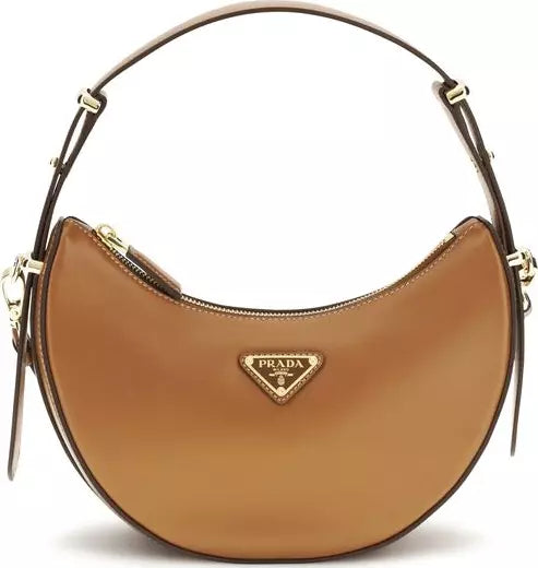 Brown Prada handbag with gold accents on a white background