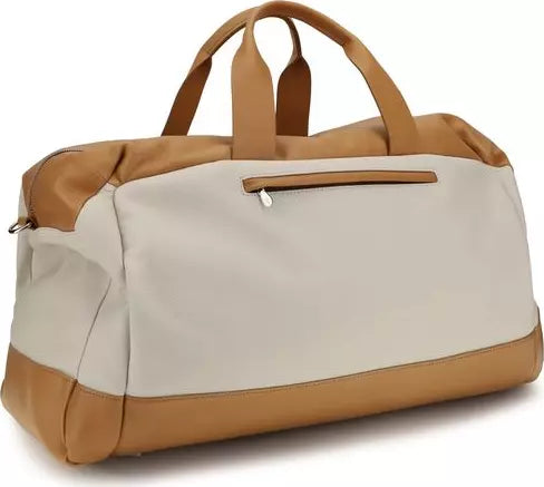 A color-blocked duffel bag with a light beige front panel, tan handles and base, and a matching tan zippered pocket on the front.