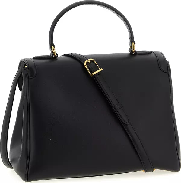 A black leather handbag with a structured rectangular shape, a top handle, a detachable shoulder strap, and gold-tone hardware, shown on a plain white background.