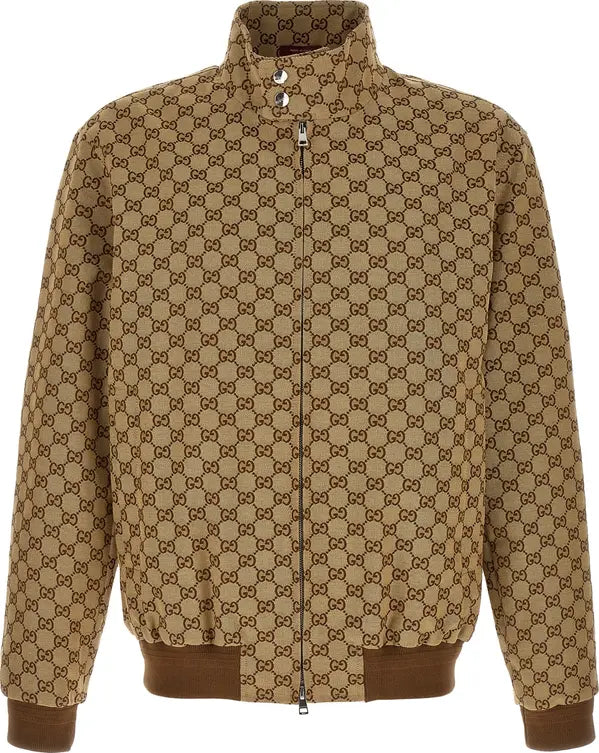 A brown and beige GG Supreme zip-up jacket with a stand-up collar, featuring the iconic interlocking GG monogram pattern across the entire fabric.