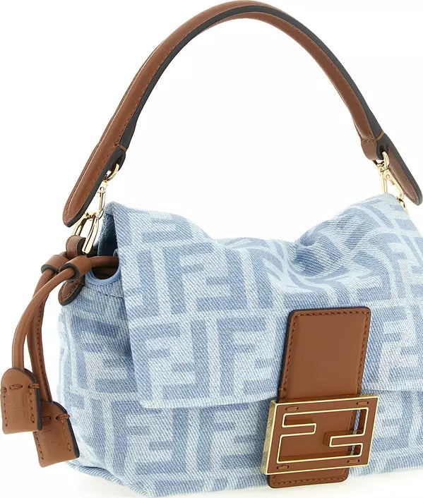 A Fendi shoulder bag in light blue canvas with the signature FF monogram pattern, featuring brown leather trim, handle, and front strap closure with a gold-tone FF logo clasp.