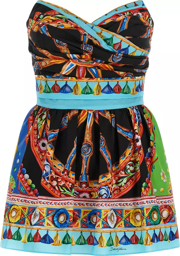 A strapless mini dress featuring a vibrant multicolor baroque and mandala print on a black base, with a bright turquoise blue waistband and hem.