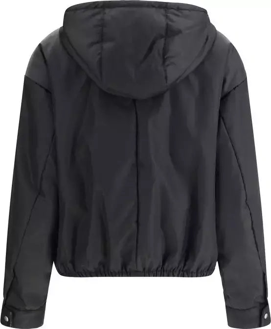 A black hooded jacket shown from the back, featuring a smooth matte finish, a central seam, and elasticized cuffs and hem, photographed against a plain white background.