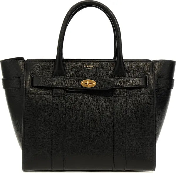 A black pebbled leather tote bag with double top handles, a front strap detail, and a gold-tone Mulberry London turn-lock clasp, shown on a plain white background.