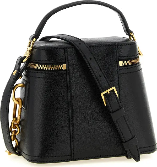 A black pebbled leather top-handle handbag with gold-tone hardware, including a top zipper, side zipper, chain detail, and buckle, shown on a white background.