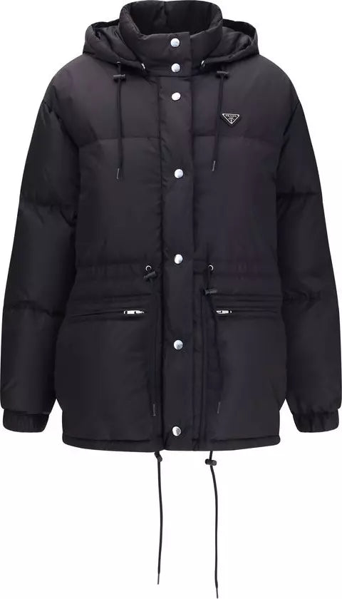 A black hooded puffer jacket with a snap-button front, drawstring details, and a small triangular Prada logo on the left chest, shown against a plain white background.