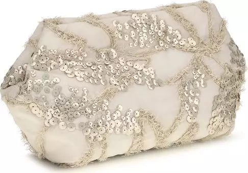 A small structured evening clutch bag in a warm ivory or champagne beige fabric, heavily embellished with shimmering silver sequins and fringed trim, set against a plain white background.