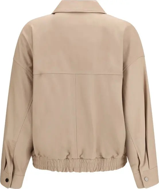 A beige utility jacket shown from the back, featuring a structured collar, long sleeves, and an elasticated hem, photographed against a solid white background.
