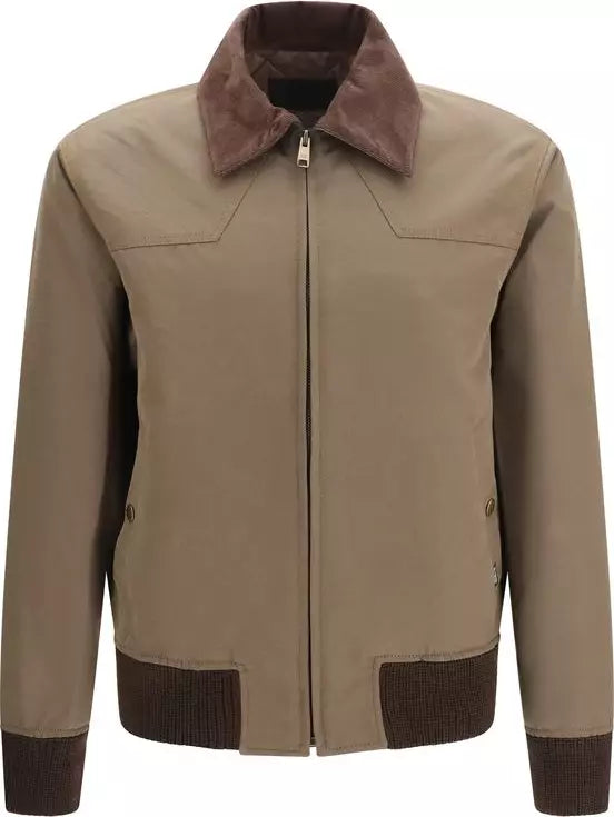 A tan zip-up jacket with a brown suede-like collar, brown ribbed knit cuffs, and brown ribbed knit waistband panels.
