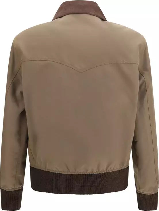 A tan western-style jacket shown from the back, featuring a brown ribbed knit collar, hem, and cuffs, and a brown suede-like lapel detail at the upper back.