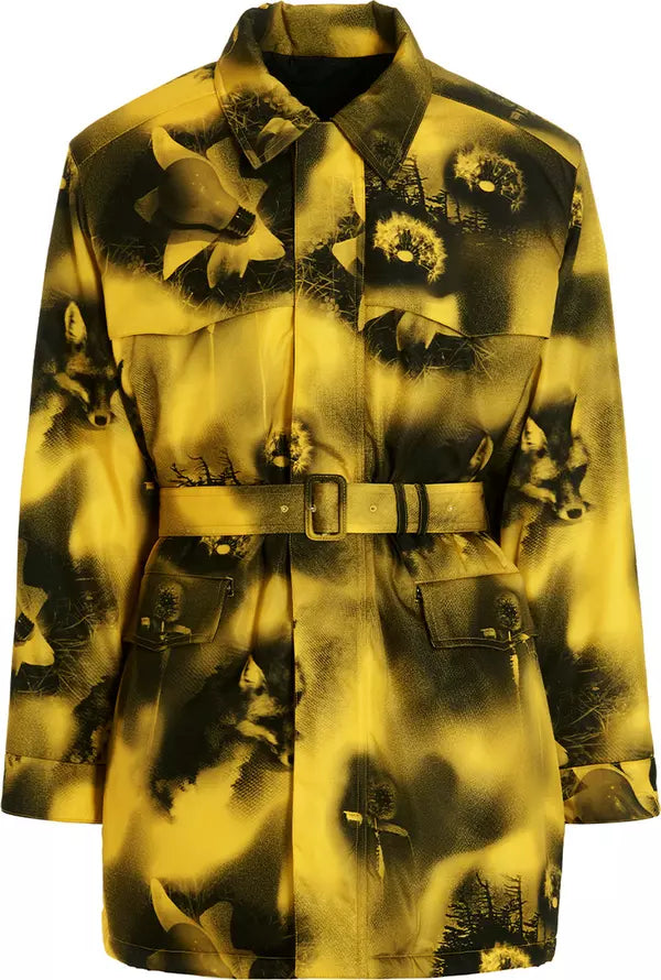 A long-sleeve collared jacket with a matching belt, featuring an abstract black and yellow pattern with stylized animal and floral motifs, shown on a plain white background.