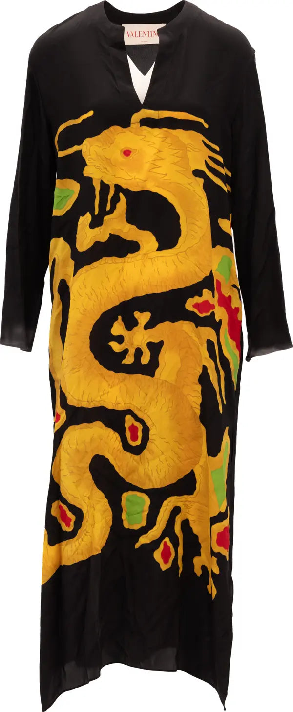 A black long-sleeve midi dress featuring a large, vibrant yellow embroidered dragon motif with small red and green accents, shown against a plain white background.