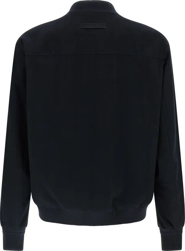 A black long-sleeve knit sweater shown from the back, featuring a ribbed mock neck, cuffs, and hem, set against a plain white background.