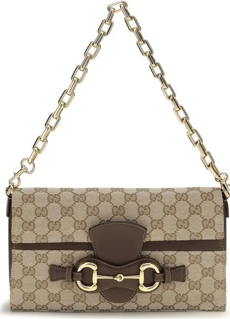 A Gucci shoulder bag in beige and brown GG Supreme canvas with a brown leather horsebit detail and a gold-tone chain strap, shown against a plain white background.