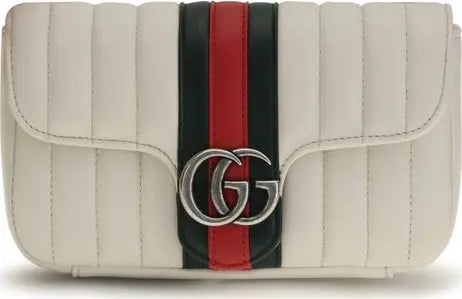 A white quilted leather shoulder bag with a vertical green and red web stripe down the center and a silver-tone interlocking GG logo clasp, characteristic of Gucci.