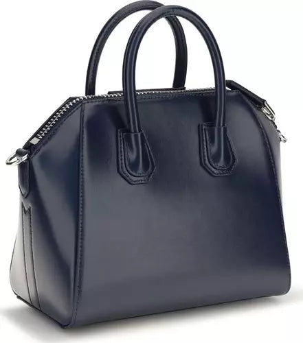 A navy blue leather handbag with double top handles, a zippered top closure, and silver-tone hardware, shown on a clean white background.