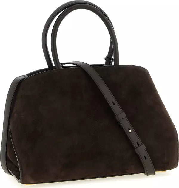 A dark brown suede handbag with black leather handles and a matching shoulder strap, shown on a clean white background.