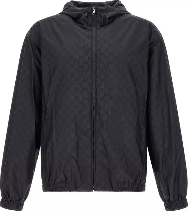 A black hooded zip-up jacket featuring an all-over tonal monogram pattern, shown against a plain white background.