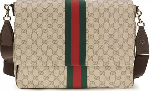 Gucci GG Supreme canvas shoulder bag with brown leather straps and a signature green and red web stripe down the center.