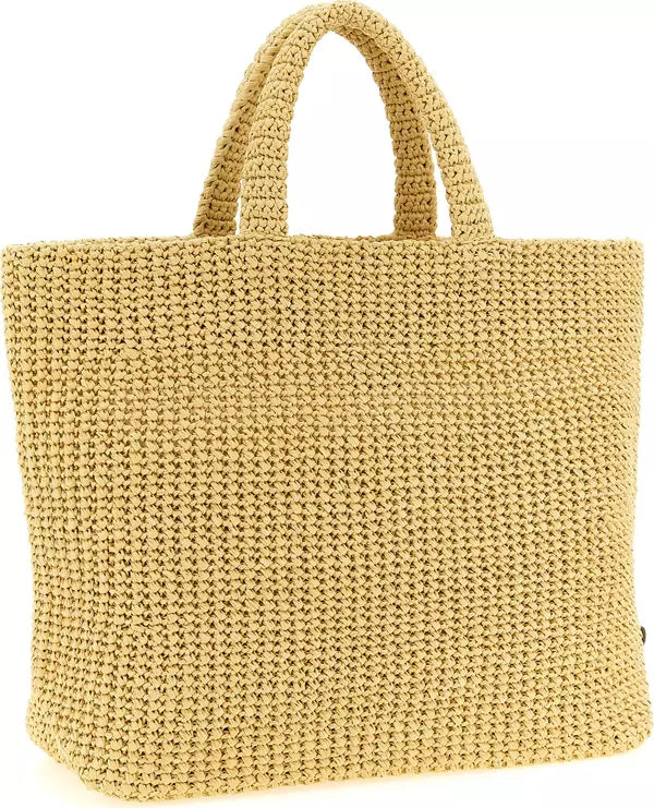 A natural straw woven tote bag with two top handles, shown against a plain white background.