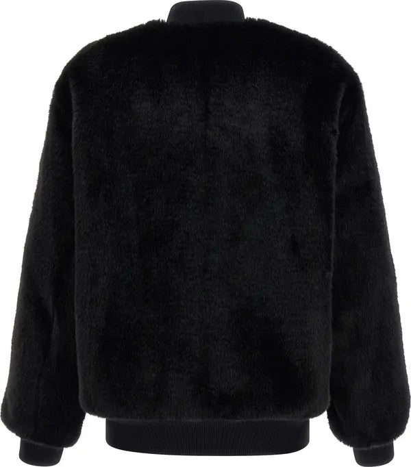 Black fuzzy faux fur jacket with ribbed knit collar, cuffs, and hem, shown from the back on a white background.