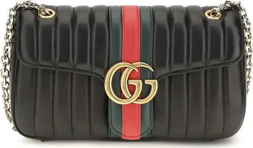 Gucci GG Marmont Jetset medium black matelassé leather shoulder bag with Double G emblem and gold-tone chain strap.