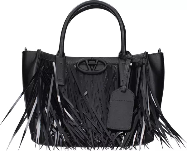 Black handbag with fringes and a visible brand logo on a white background