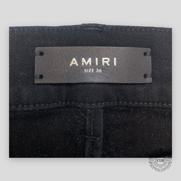 Amiri Hawaiian Star Art Patch Jeans in Black