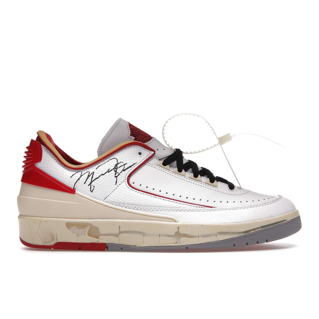 Air Jordan Retro 2 OFF-WHITE X AIR JORDAN SP 'WHITE VARSITY RED' side view with signature and red accents.