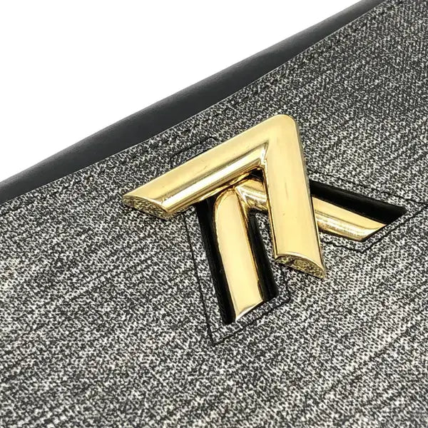 Louis Vuitton Twist PM Grey Epi Leather With GHW And Box, Dustcover - close-up of gold hardware logo.