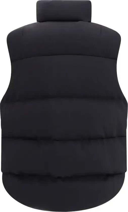 Black puffer vest on a white background