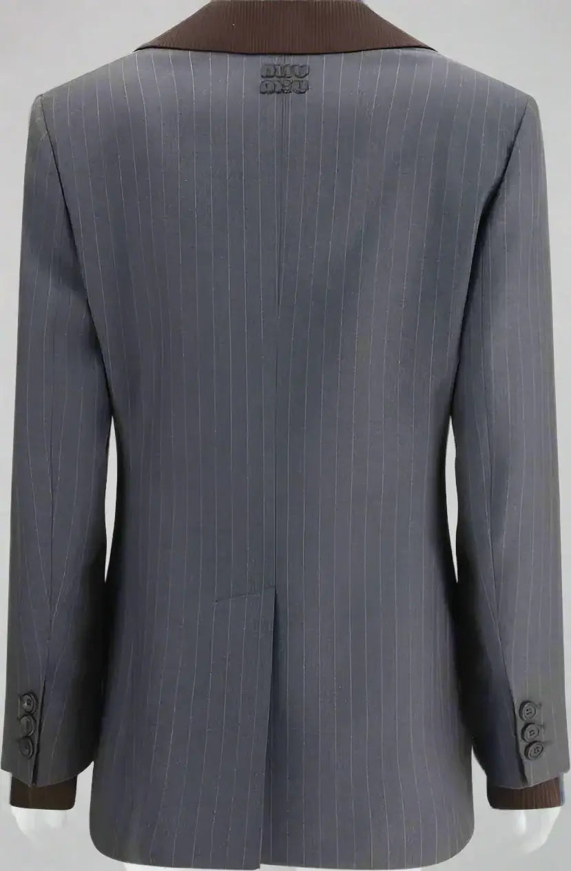 Gray pinstripe suit jacket with brown trim on a white background
