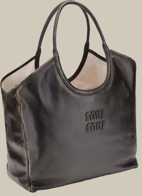 Black handbag with a visible brand logo on a white background