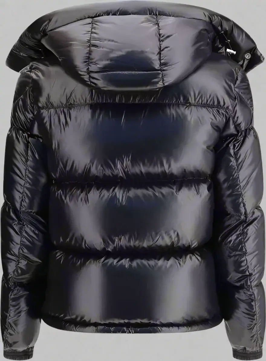 Black puffer jacket with a hood on a white background