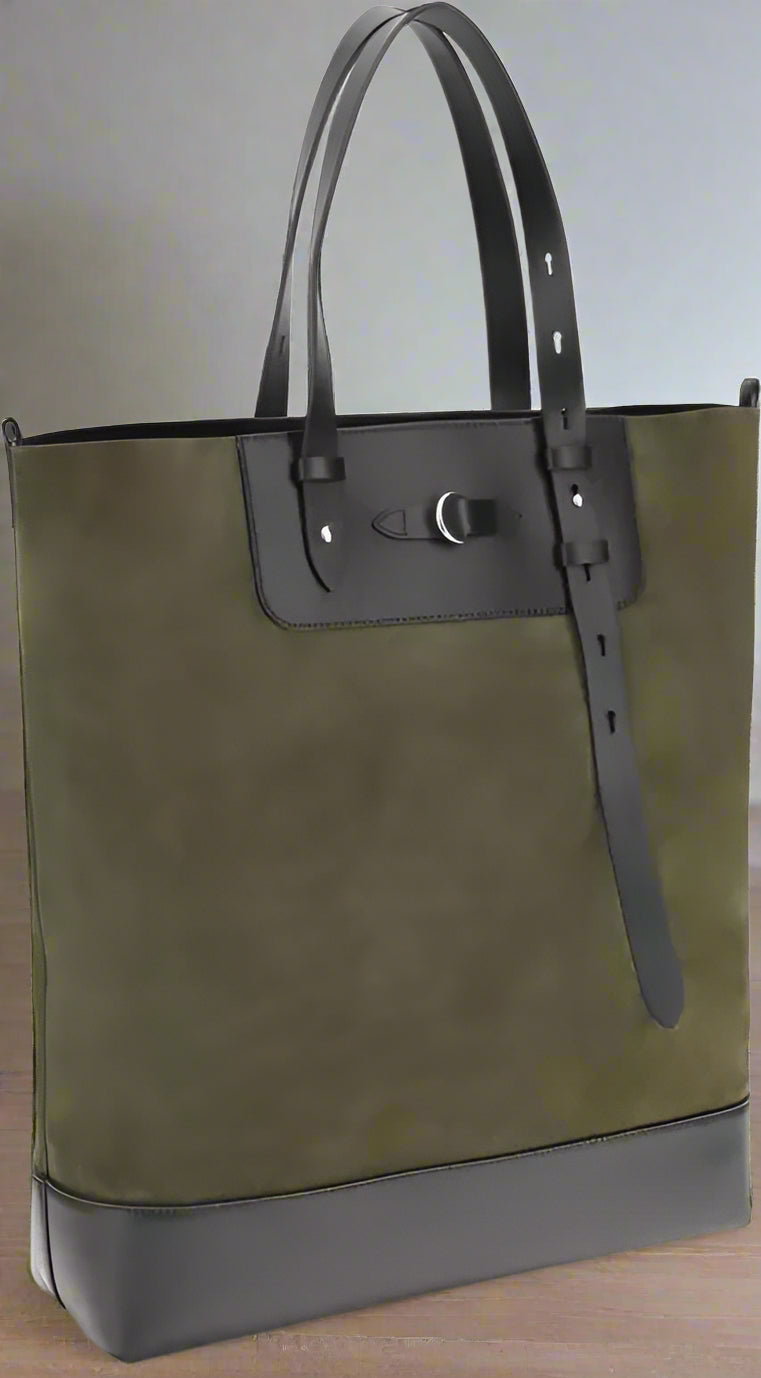Green tote bag with black accents on a white background