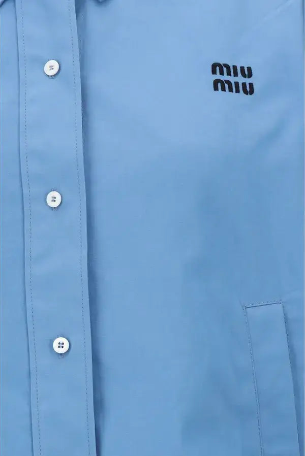 Blue shirt with a brand logo on a blue background