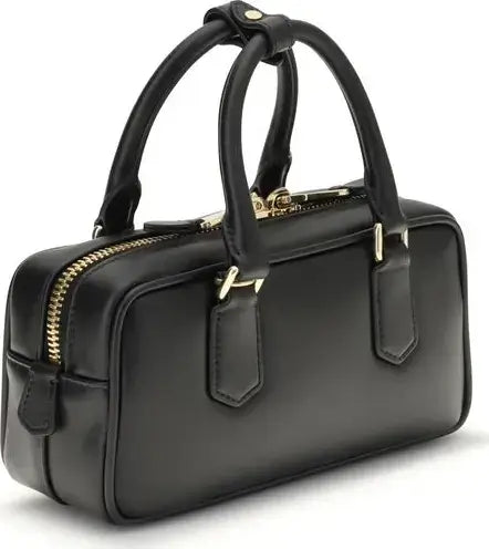 Black handbag with gold zippers on a white background
