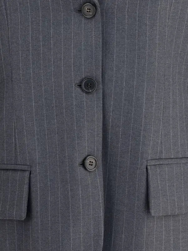 Close-up of a gray pinstripe suit jacket with button details.