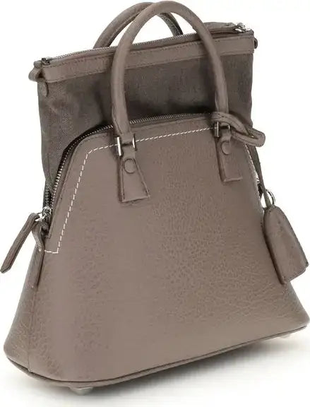 Brown handbag with multiple compartments on a white background