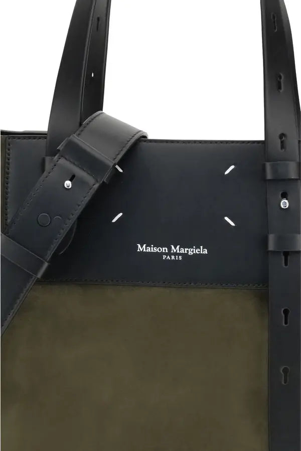 Black and brown tote bag with 'Maison Margiela' branding on a white background
