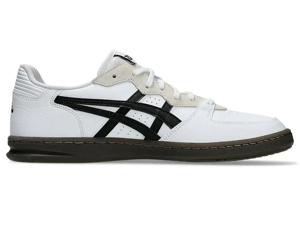 White sneaker with black logo on a white background