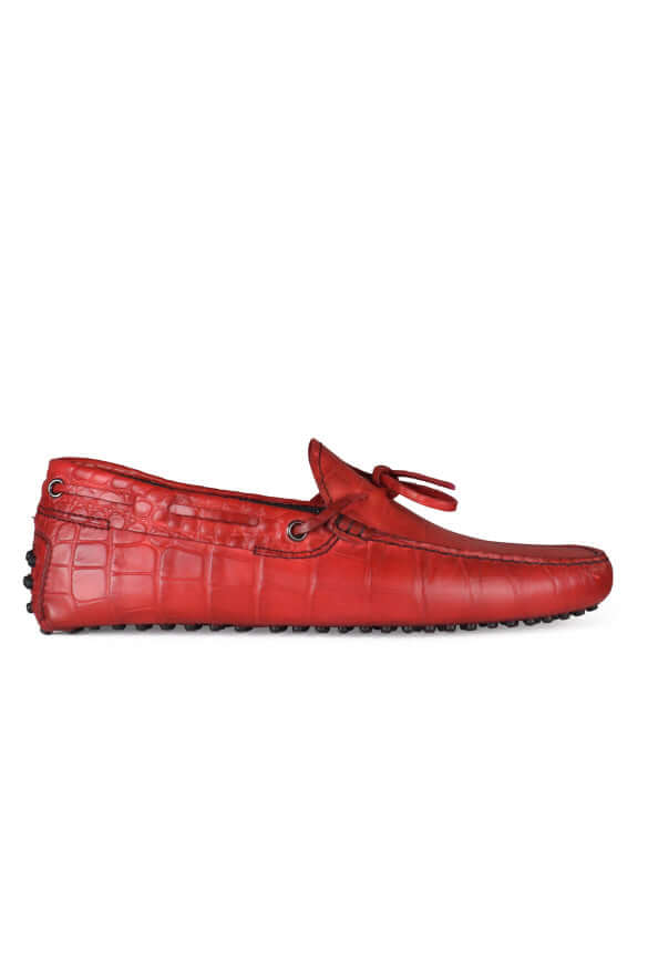 Red loafer shoe on a white background