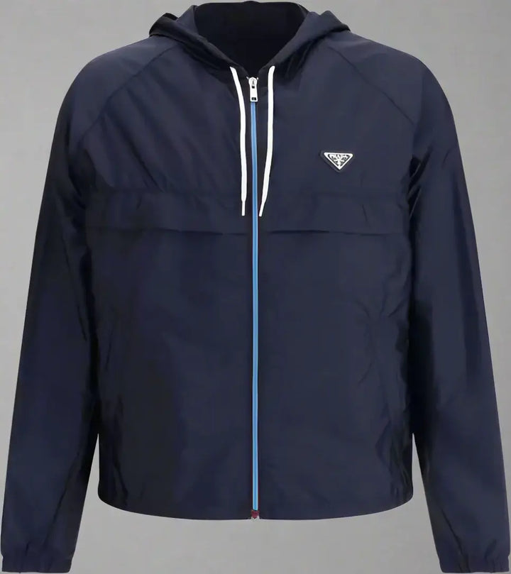 Navy blue jacket with a brand logo on a white background