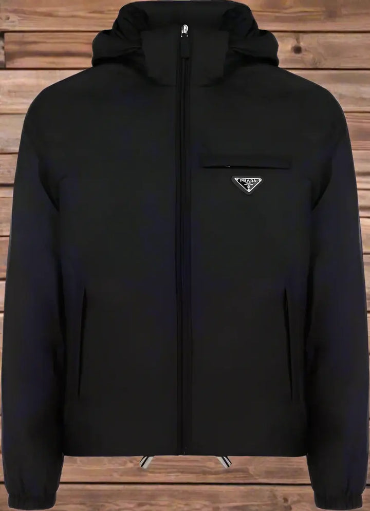 Black jacket with a brand logo on a white background