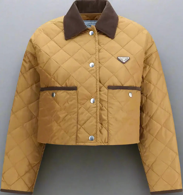 Quilted jacket with brown collar and Prada logo on a white background