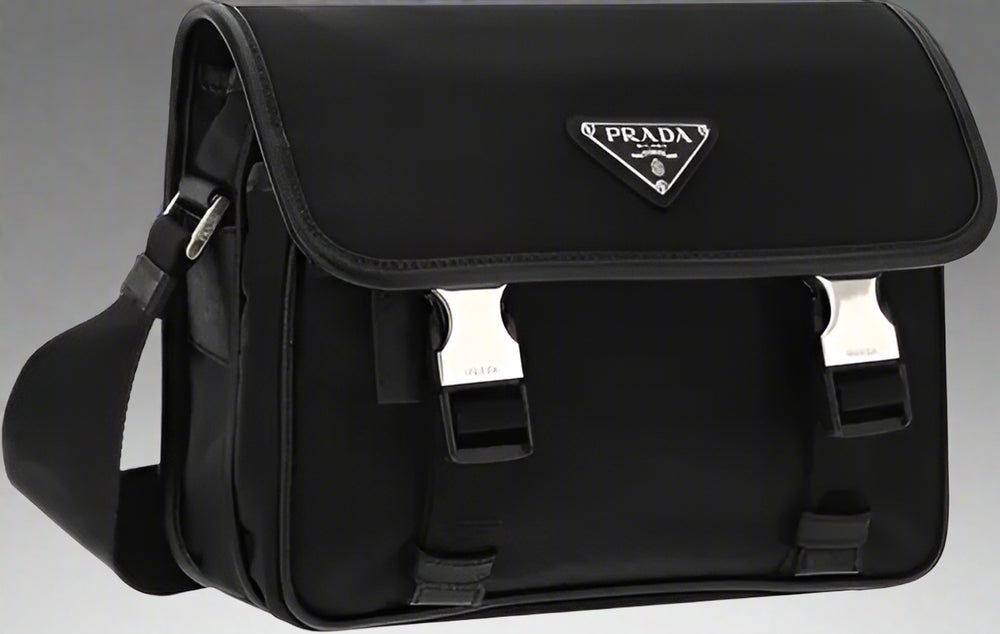 Black Prada bag with a silver logo on a white background